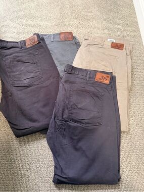 Men's Straight Fit Pants by Dockers. Black, charcoal, medium grey and beige/grey